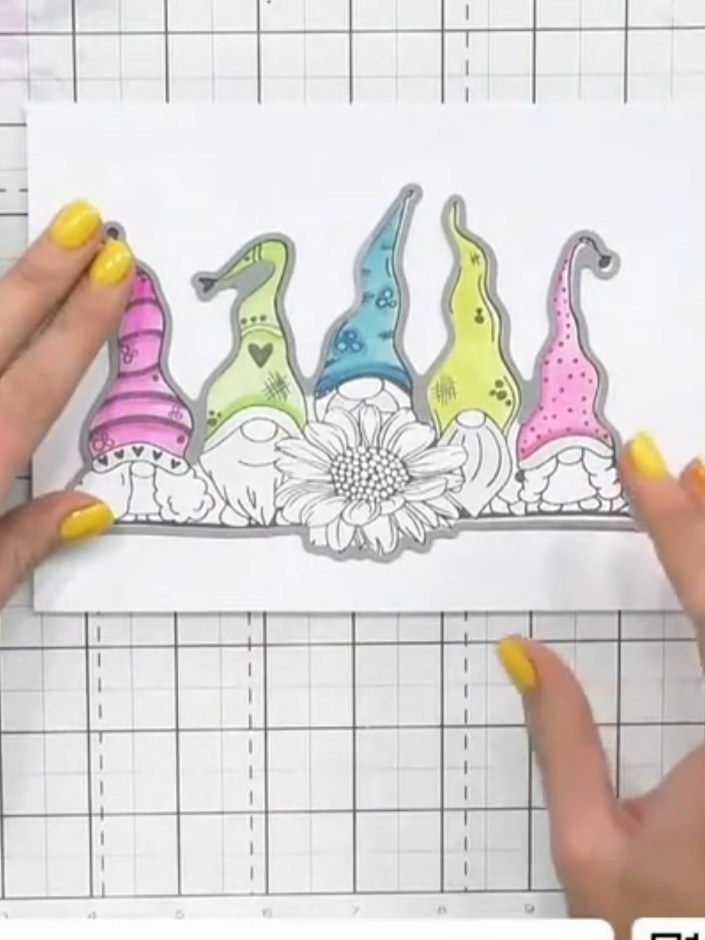 Step 3: Stamp the gnome design onto white cardstock using the Stamps By Me Sunshine Gnomes stamp set. Colour in the gn
