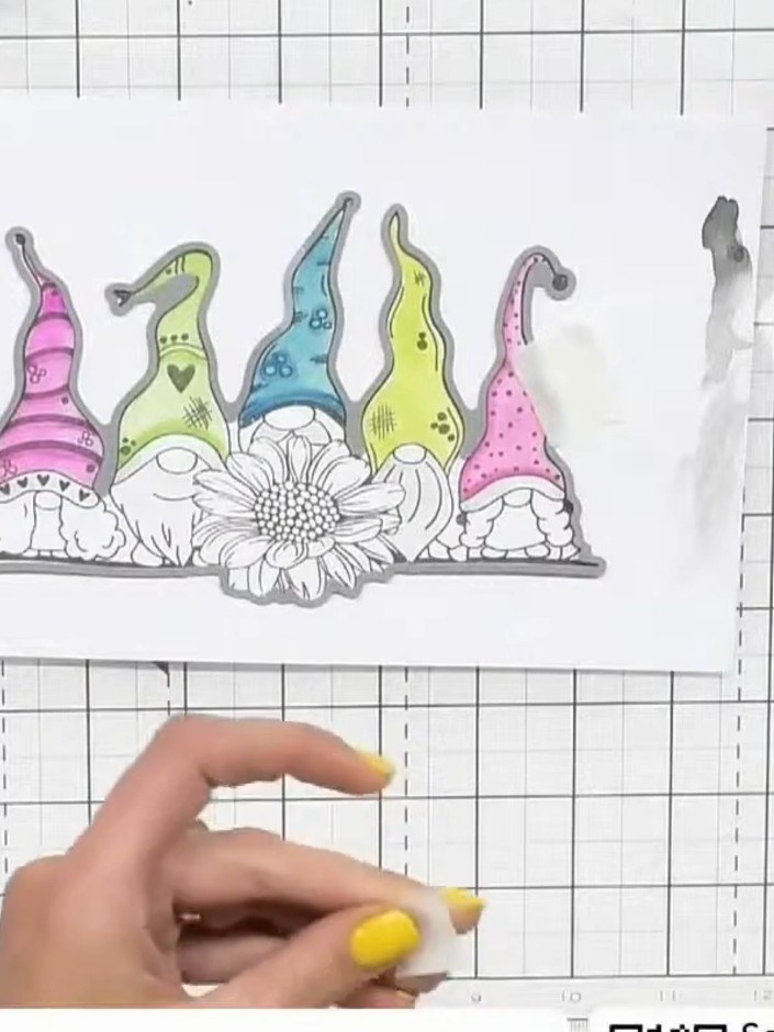 Step 4: Die-cut the stamped gnome image using the coordinating die to create a one millimetre border around the design