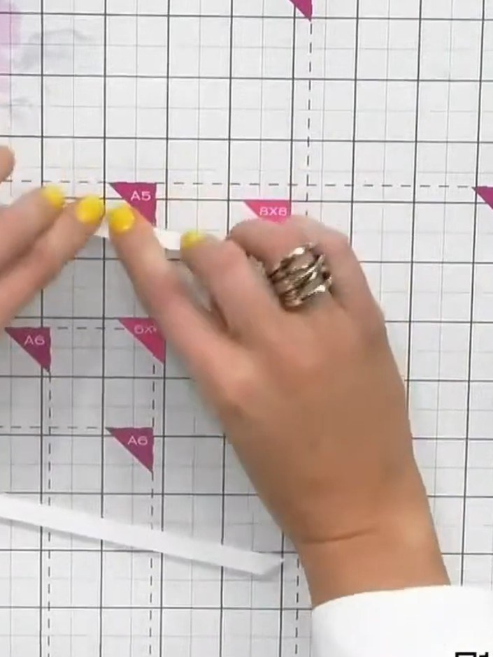 Step 1: Burnish the score lines on the pre-scored acetate shaker card window using a bone folder or scoring tool to cr
