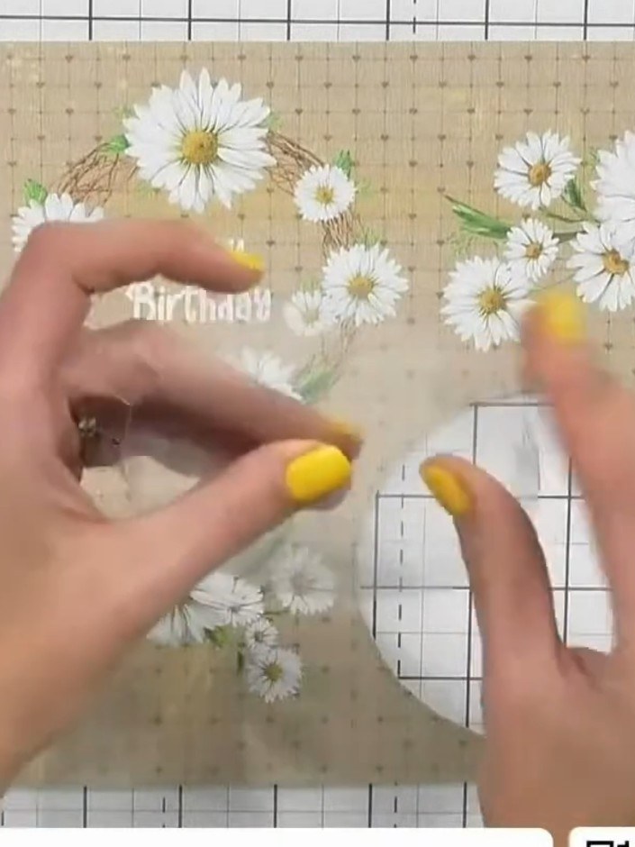 Step 2: Place the circular acetate window on top of your chosen patterned paper from the paper pad. Position it where 