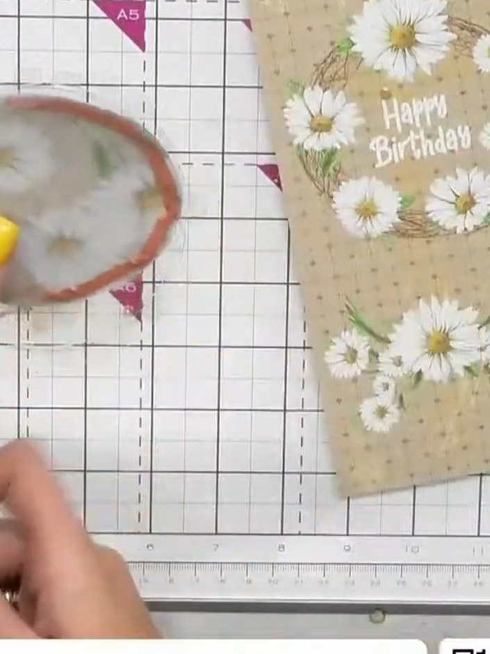 Step 7: Apply double-sided tape to the back of the circular acetate window, ensuring the edges are fully covered for s
