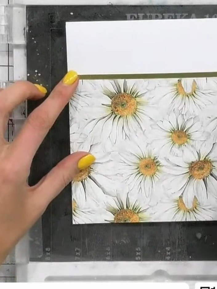 Step 1: Cut a piece of patterned paper from the Sunshine In My Pocket paper pad to fit your card base. Position the da