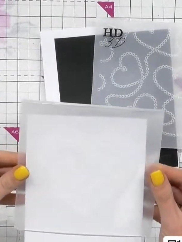 Step 1: Place your white cardstock into the embossing folder, positioning it towards the top of the card. Ensure the c