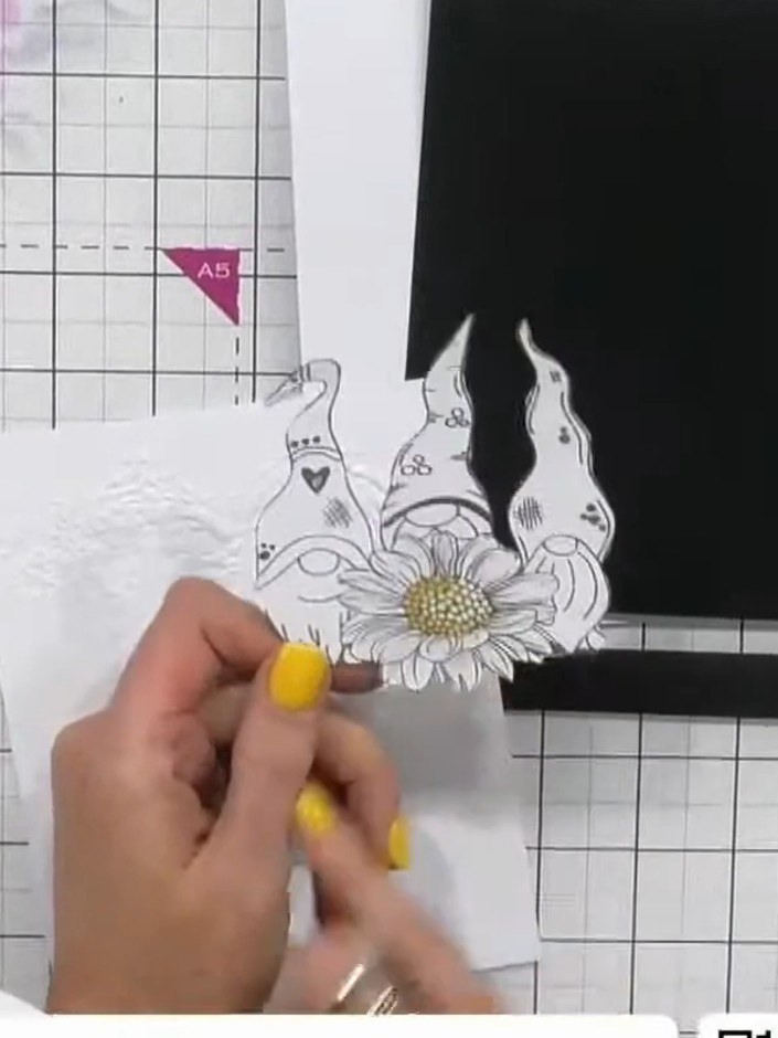 Step 4: Stamp the gnome design onto white cardstock using black ink. You can stamp just the centre gnome or all three 