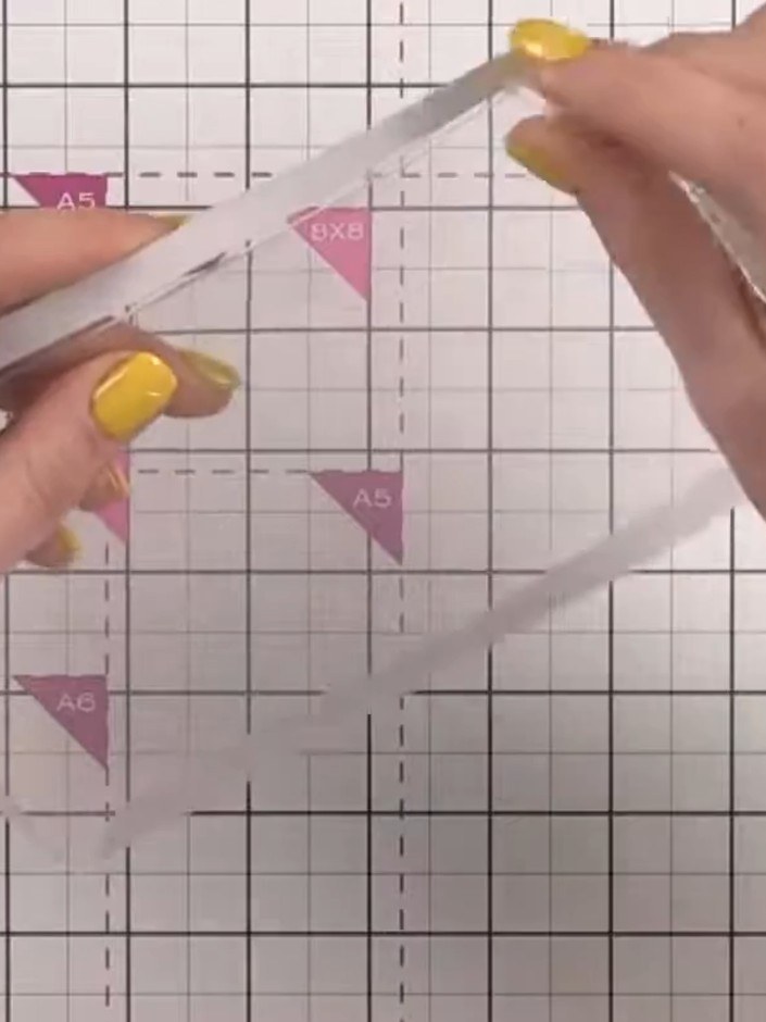 Step 5: Carefully peel away the protective film from the edges of the clear acetate window to avoid leaving fingerprin