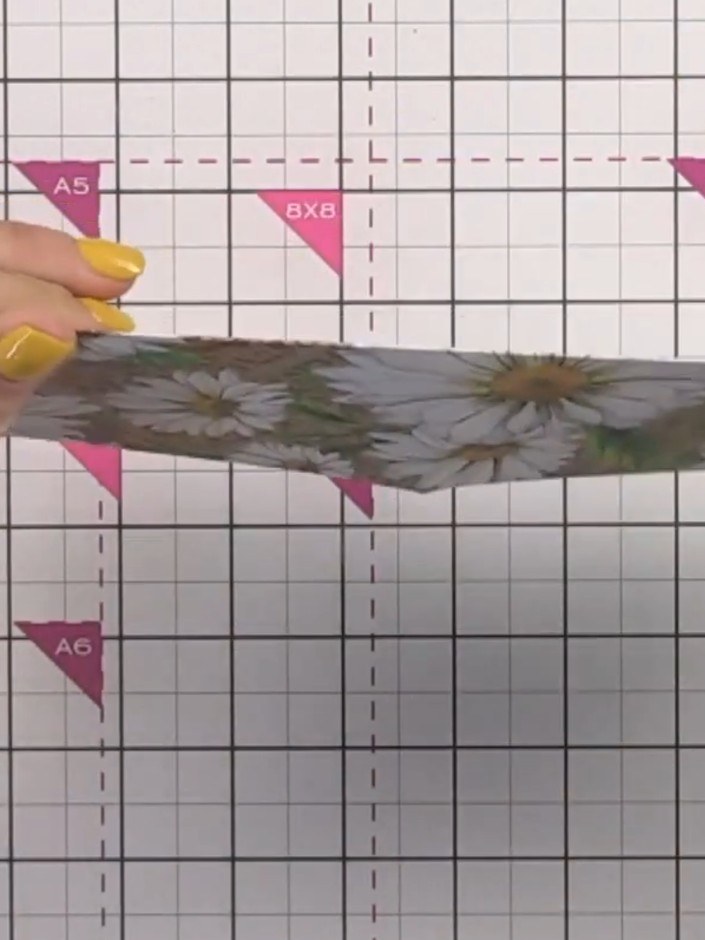 Step 3: Fold the decorative paper along both score lines to create creases. Ensure the folds are sharp and well-define