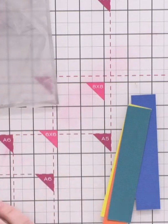 Step 1: Cut several strips of cardstock in varying colours, approximately 5 inches (13 cm) tall. Vary the widths of th