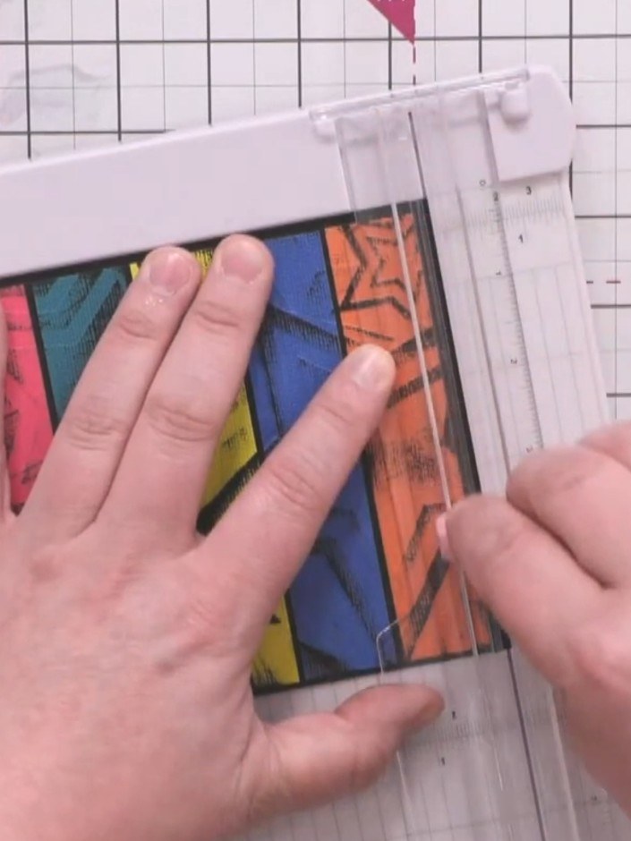 Step 9: Using a paper trimmer, trim the edges of the stamped strips to create a balanced, symmetrical edge on your pan