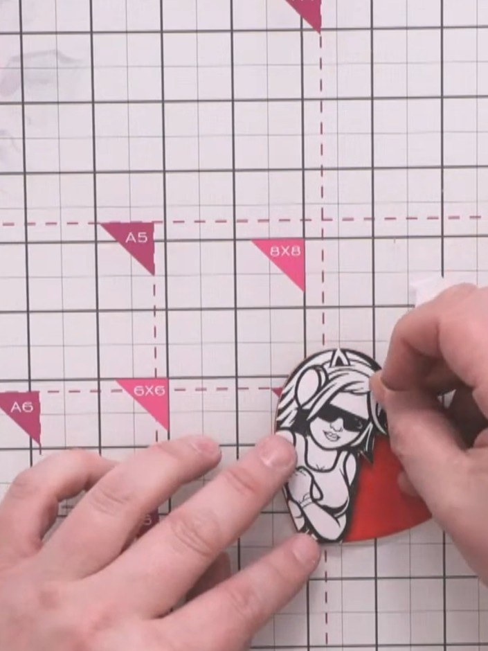 Step 13: Mount the large red heart and the character stamp onto black cardstock. Carefully cut around both pieces leavi