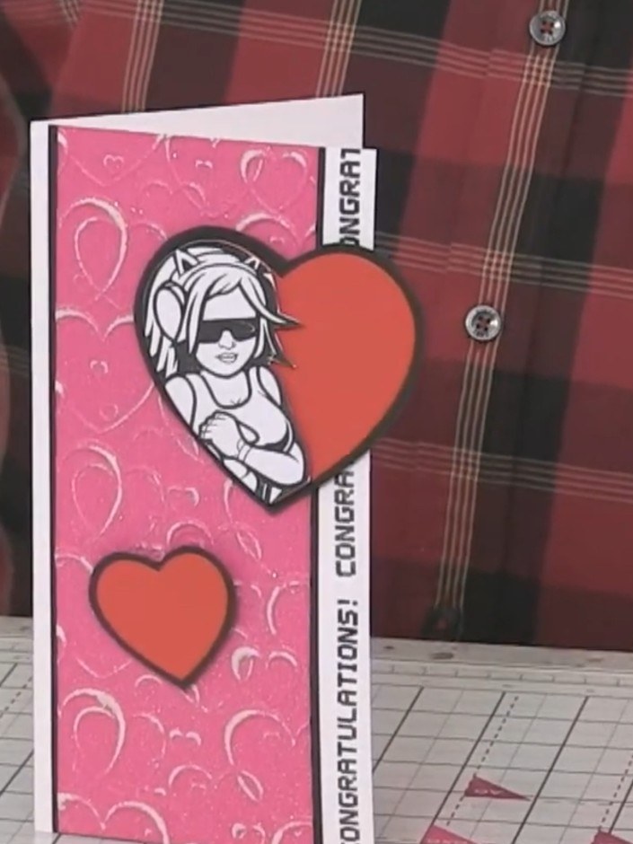 Tarjeta con corazones en embossing lijados y personaje con corazón - the finished project