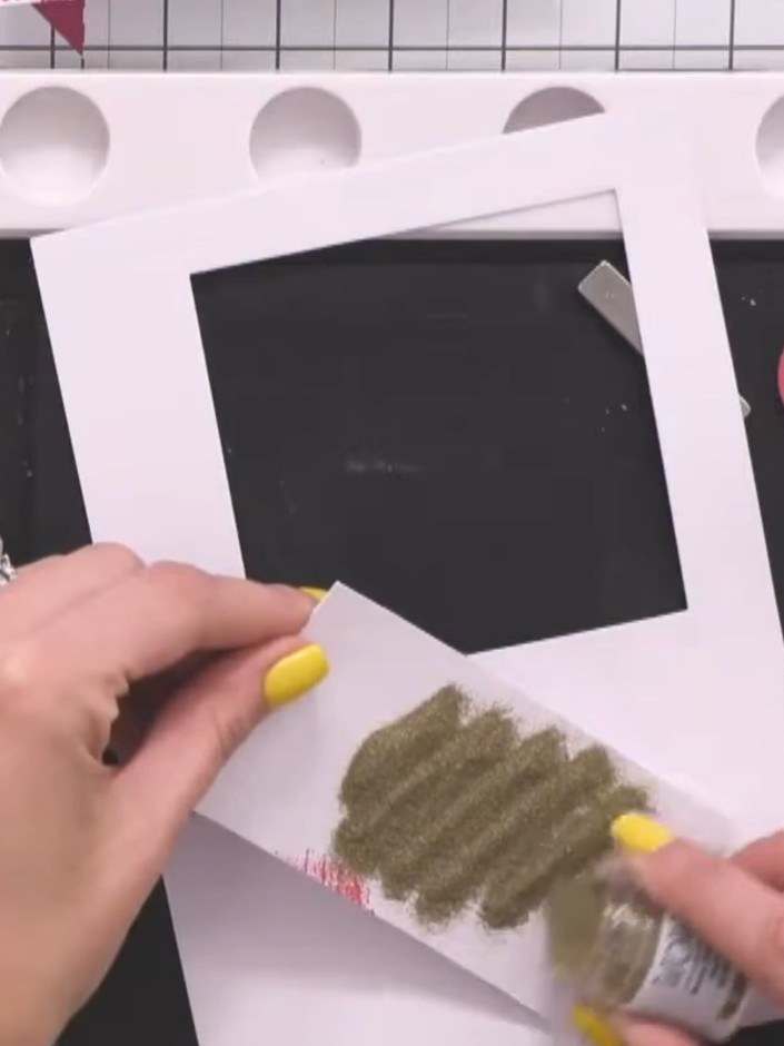 Step 5: Heat emboss the stamped girls image using gold embossing powder. Apply the powder generously over the stamped 