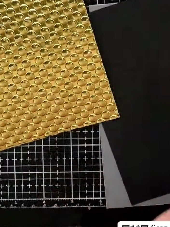Step 5: Run a piece of blue card through the retro dots embossing folder to create an embossed circular pattern on the