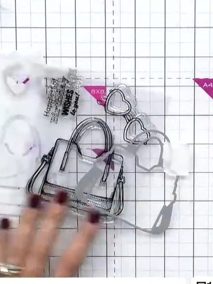 Step 1: Lay out your white card stock on the craft mat. Position stencil number one over the card stock, using the ali