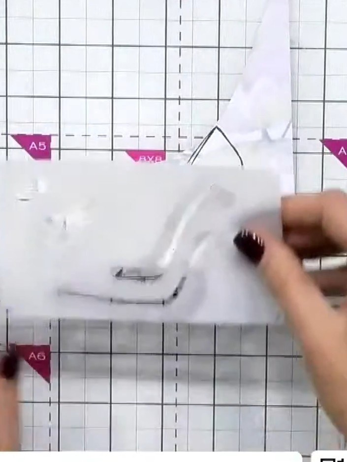Step 3: Select a stencil to add shadow detail inside the shoe opening. Apply a darker ink colour through the stencil t
