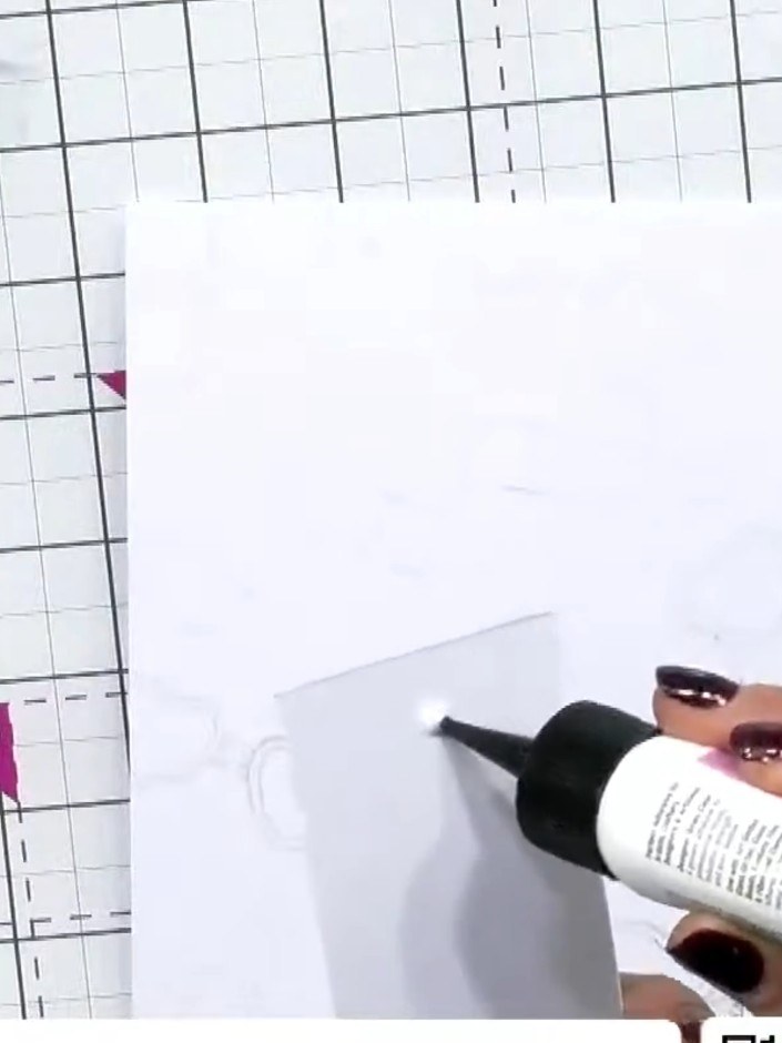 Step 6: Apply watermark ink to the lipstick and glasses stamp. Press the stamp onto your white card base to create a s