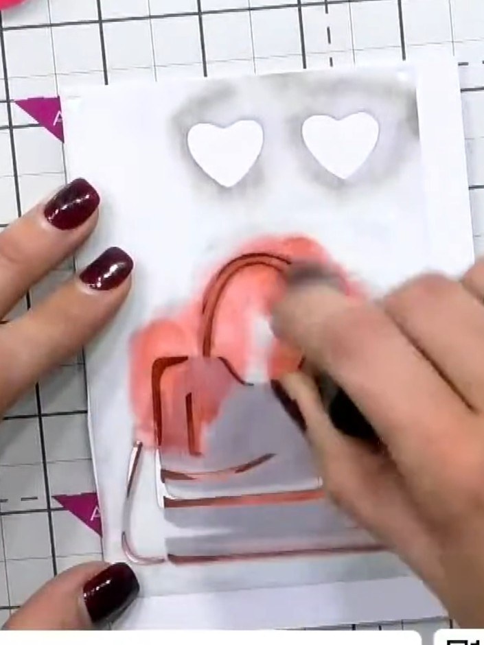 Step 3: Apply the third stencil layer using a darker pink or coral shade. Press the ink firmly through the stencil to 