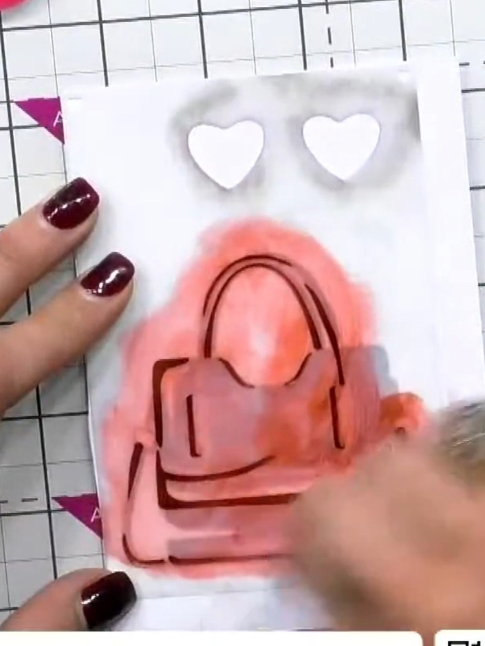 Step 4: Heat set your stencilled lipstick design with a heat gun to set the inks and ensure they are fully dry before 