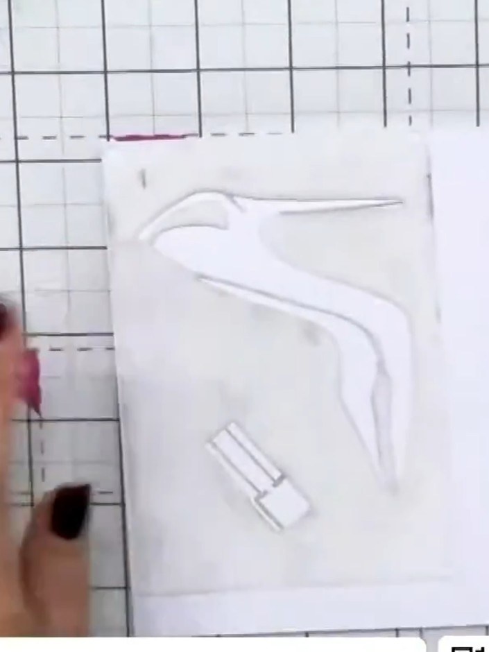 Step 1: Position stencil number one at the top left corner of your white card stock. Use the four hearts in the corner