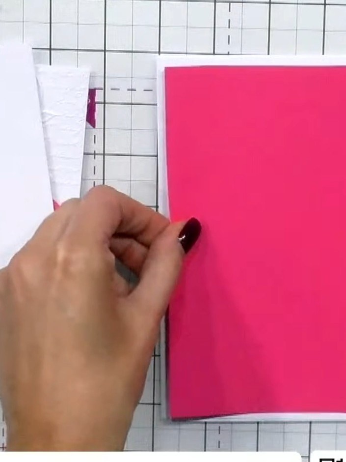 Step 5: Cut a second piece of pink patterned cardstock from the collection. Layer it onto your white card base using d
