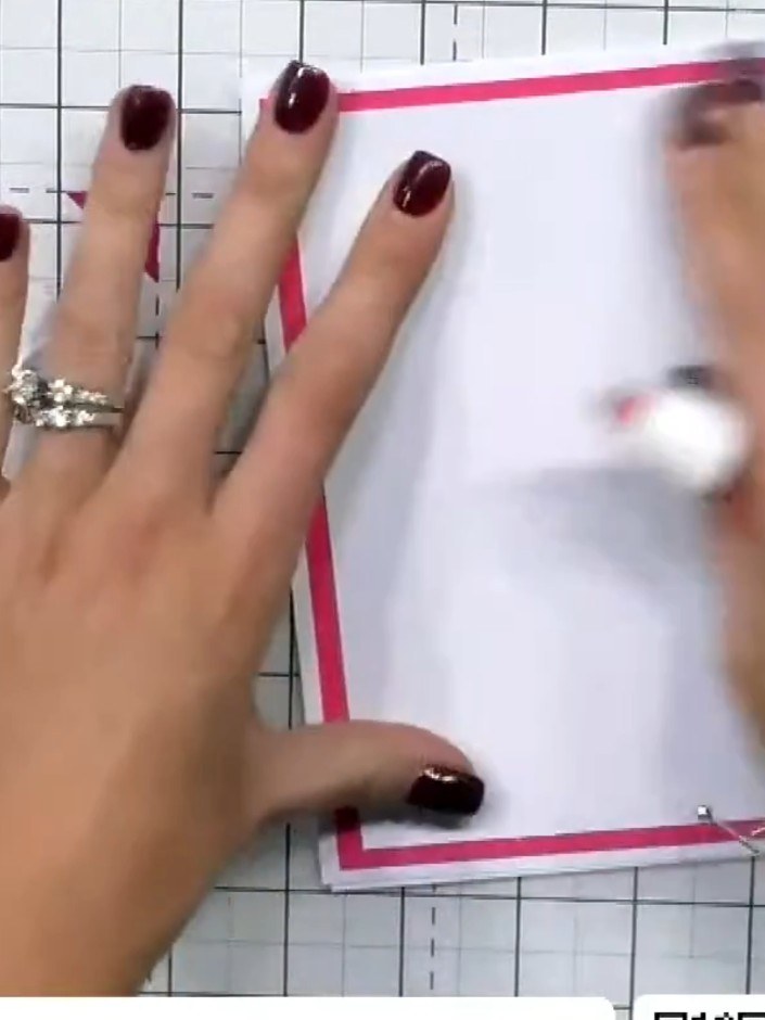 Step 6: Attach the embossed white piece to the front of your pink card base, positioning it centrally as your focal po
