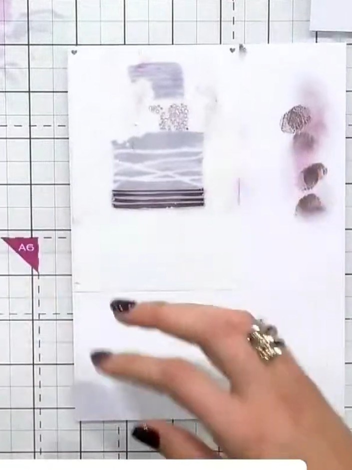 Step 5: Position stencil three over your card panel. Apply gold sparkle paste through the spots and lines of the stenc