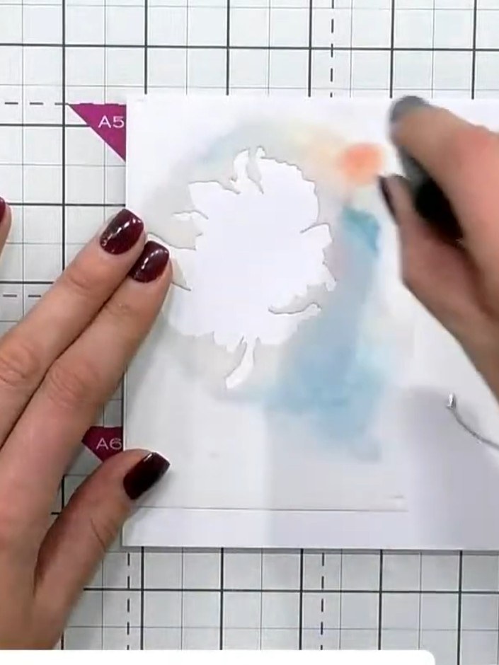 Step 1: Position stencil one in the corner of your card base, using the registration marks on the stencil to align it 