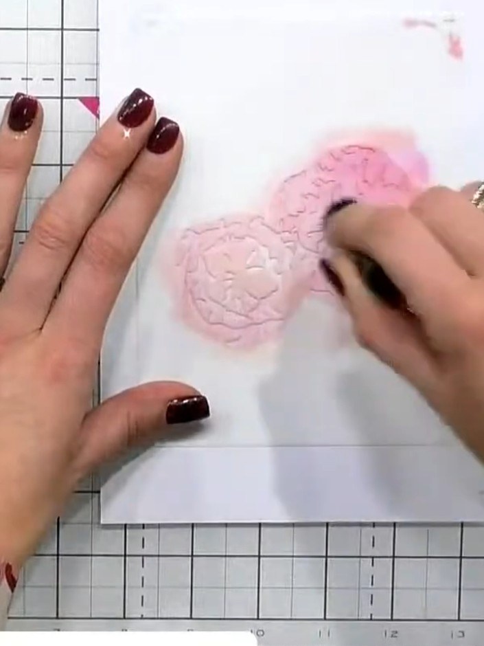Step 3: Position the second stencil using the registration marks (A5 and A6). Apply the same pink ink pad to the desig