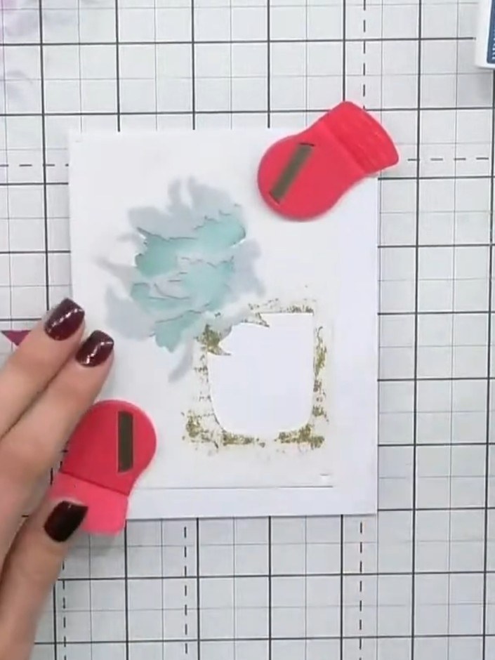 Step 3: Remove the first stencil carefully. Position stencil number two over the card, making sure you can see the num