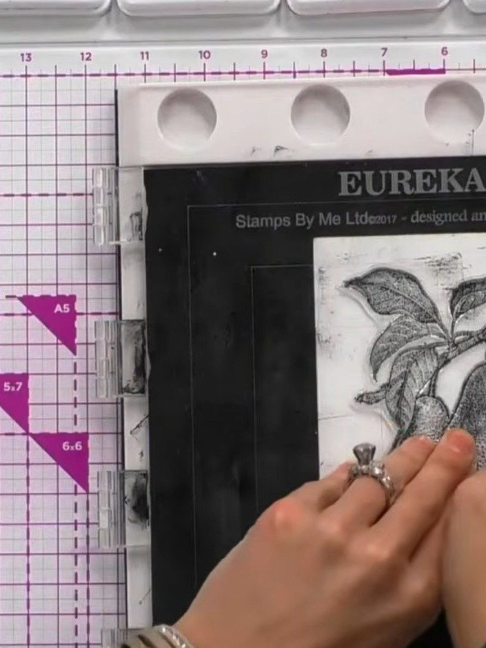 Step 5: Examine the finished card to appreciate how the stamped pear image combines with the embossed details to creat