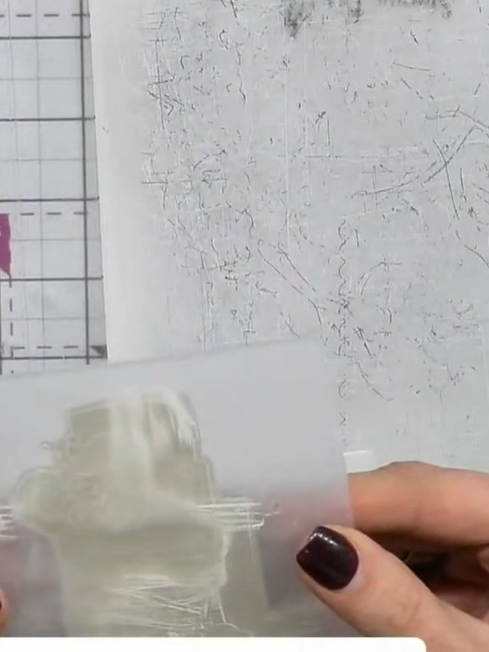 Step 2: Line up the 3D embossing folder with the detail on the front of the die-cut cake piece, taking time to align i