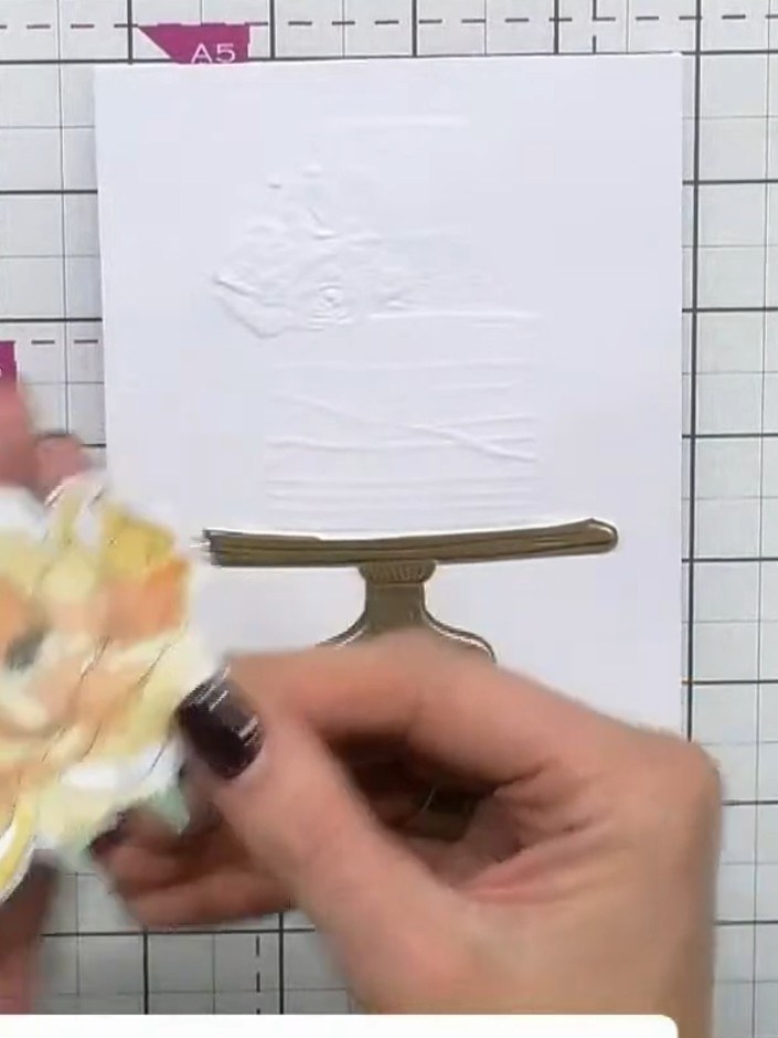 Step 7: Cut away the perfume bottle from the previously made gold sparkly flower design to isolate the large flower el