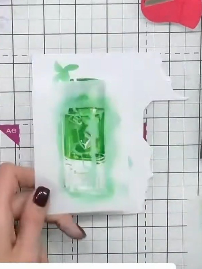 Step 4: Apply medium green ink through the second stencil layer to add depth to the drink in the glass. Position the s