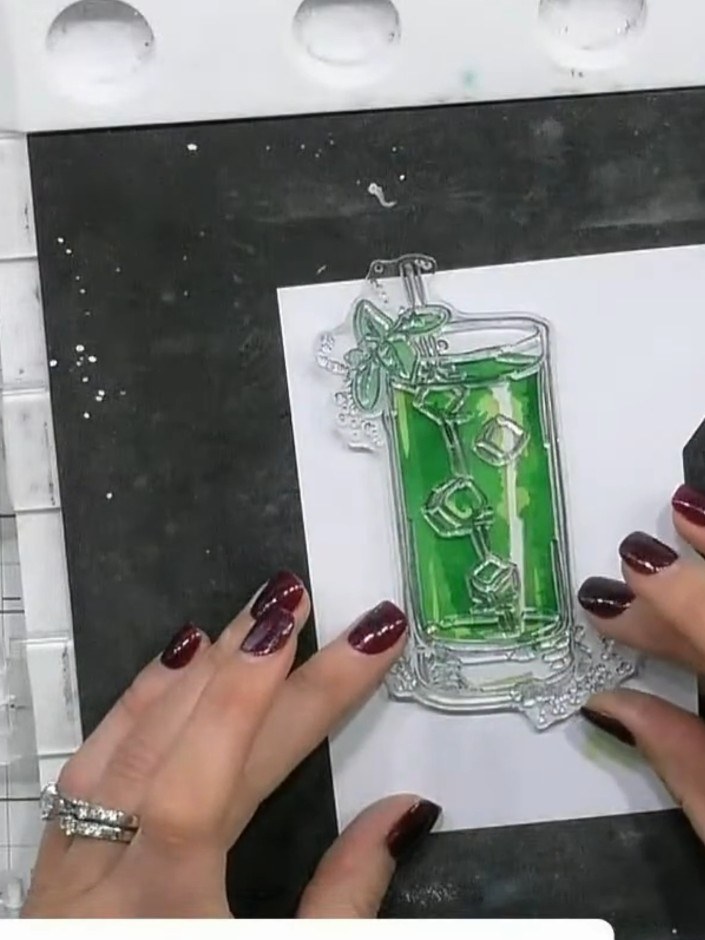 Step 5: Position stencil number three over the glass image and apply a darker green or heathery shade to add depth and
