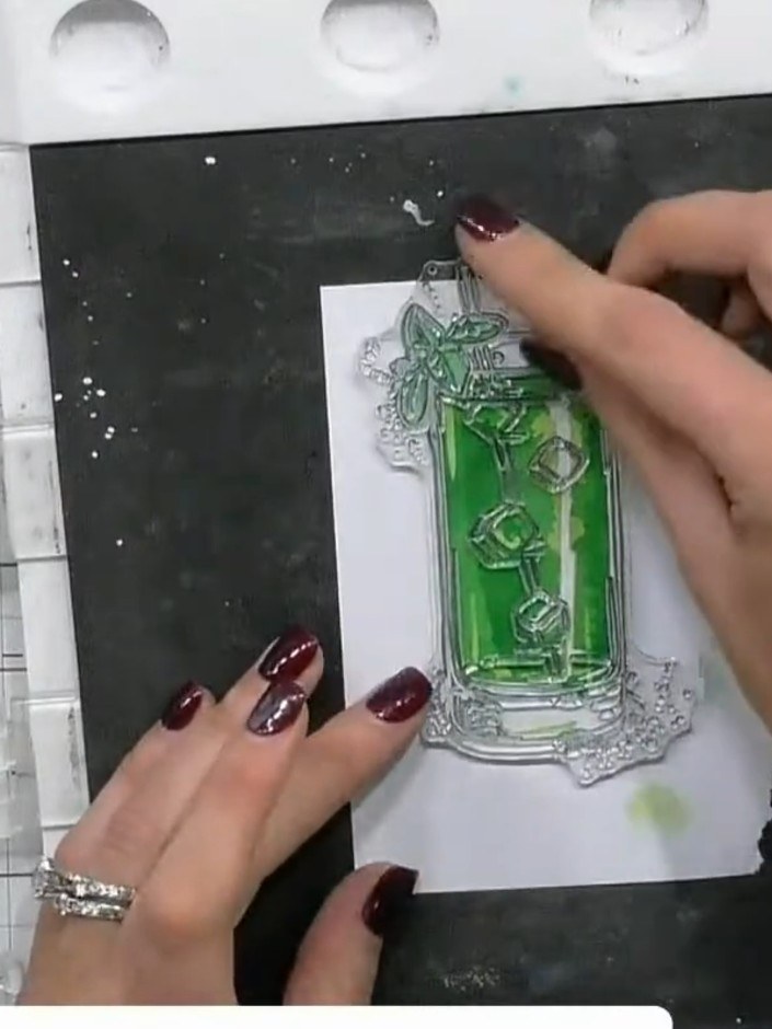 Step 6: If the green colour is not dark enough, reposition the glass stencil and apply additional green ink to deepen 