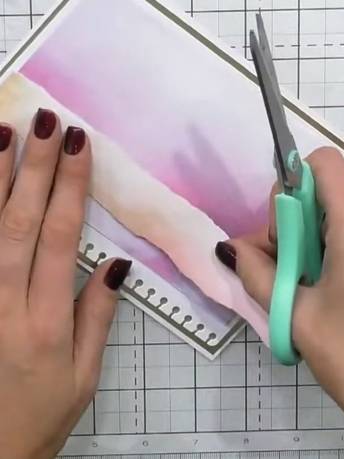 Step 4: Take an off-cut of the patterned paper with the pink, yellow and purple gradient design. Trim it to create a s