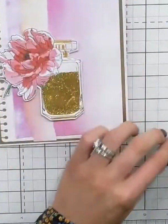 Step 8: Attach foam pads to the back of the die-cut flower. Position the flower dimensionally on the card front above 