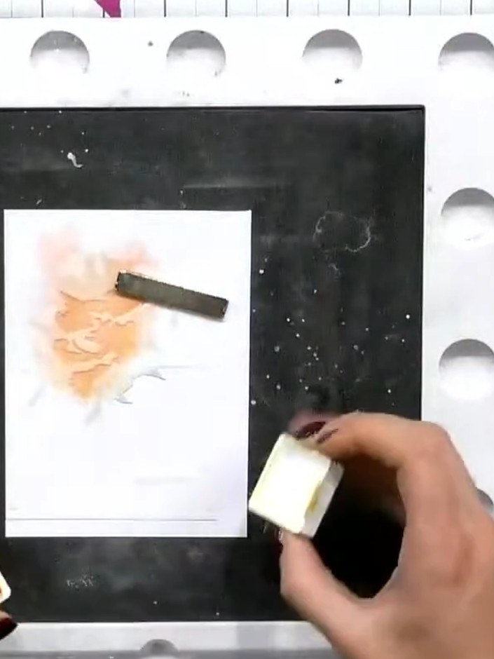 Step 6: Stamp the perfume bottle outline using a black hybrid ink pad, positioning it centrally over your stencilled f