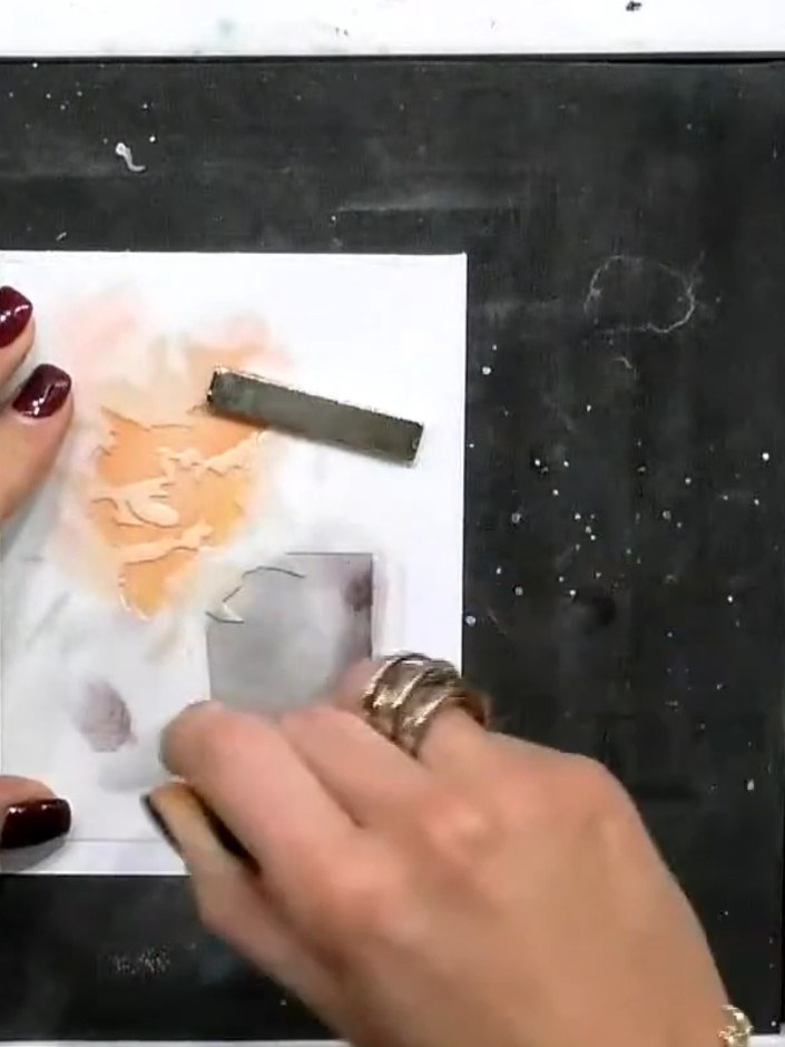 Step 7: Position the coordinating die over your stamped perfume bottle design and secure it in place with low-tack tap