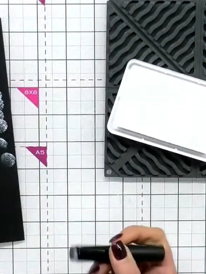Step 4: Position the stamped design into the 3D embossing folder, lining it up carefully on the grid mat for best resu