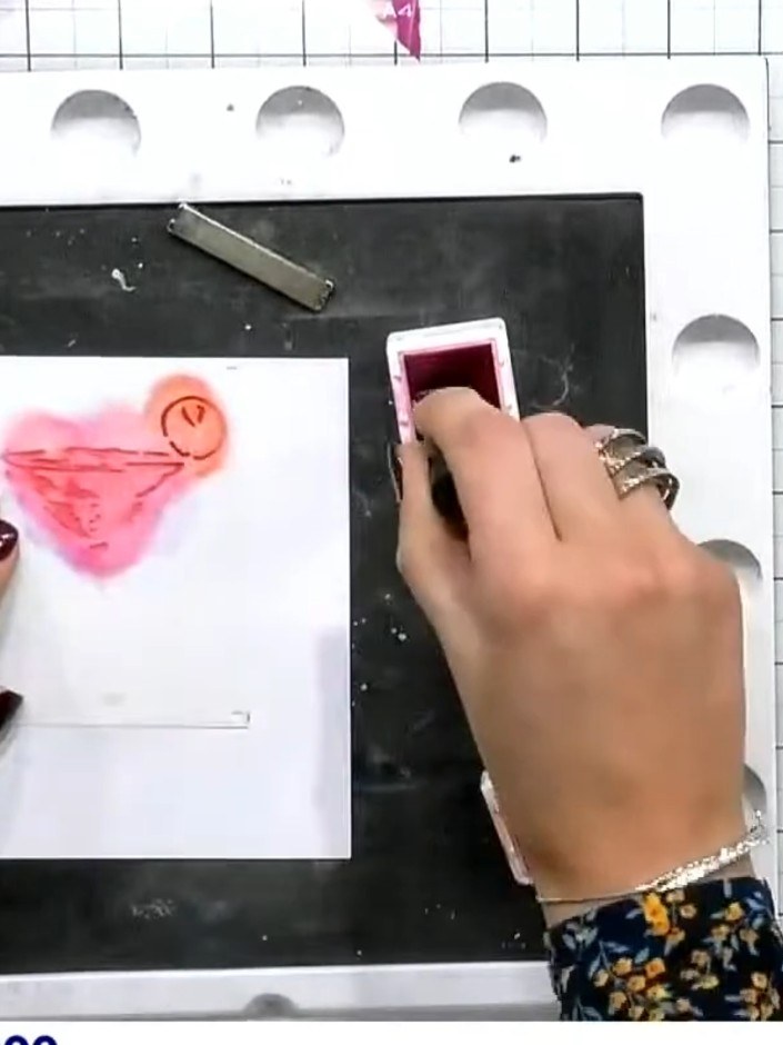 Step 3: Position stencil number three with the number facing you. Apply dark burgundy ink to the stencil to create the