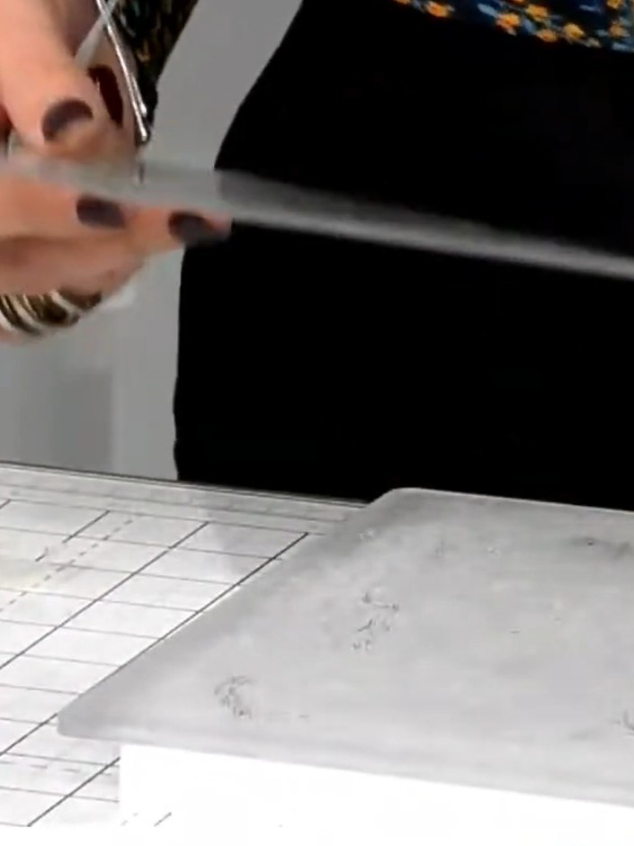 Step 8: Remove the card from the embossing folder and admire the 3D embossed effect visible on both the front and back