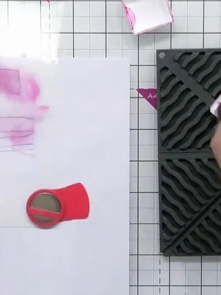 Step 2: Using the first stencil from the Quattro D set, lightly brush pink ink through the stencil onto your white car