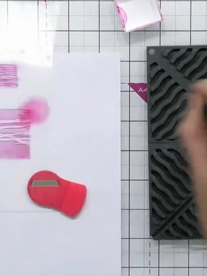 Step 3: Remove the first stencil and position the second stencil over your work, lining it up using the heart guides i