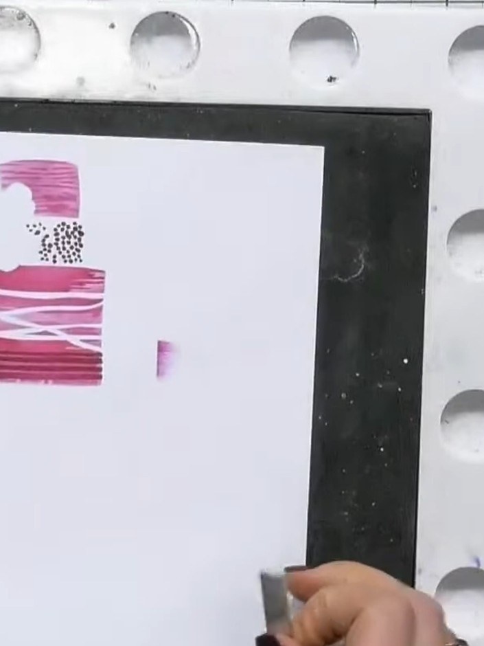 Step 8: Place the die-cut cake into the 3D embossing folder, ensuring it lines up correctly. The cake will only fit on