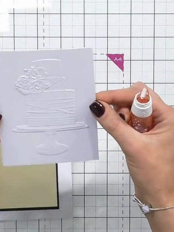 Step 2: Place the embossing folder with your card inside into your die-cutting machine and run it through to create th