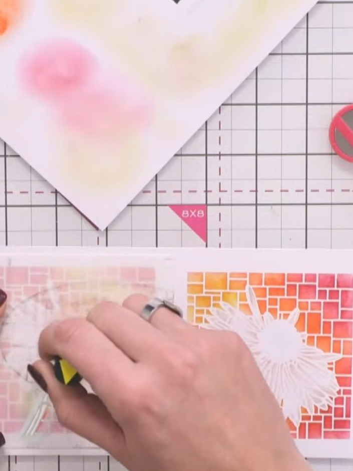Step 7: Apply yellow ink lightly all over the centre of the stencilled design. Add darker yellow ink at the base to cr