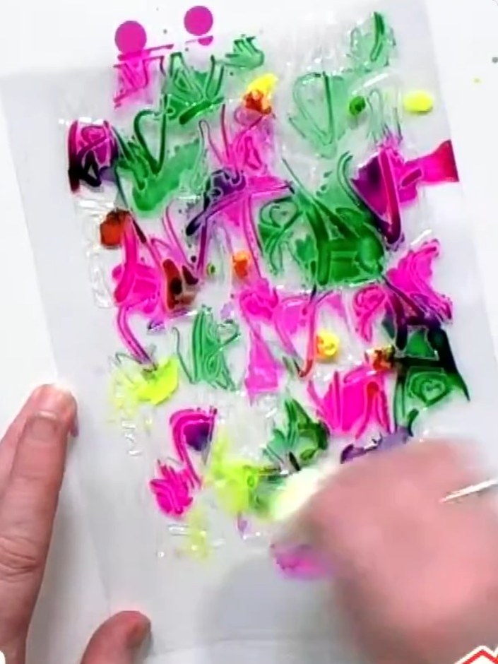 Step 5: Apply Cadence Mirror Mist over the dried alcohol inks to seal and add a reflective, metallic finish. Spray eve