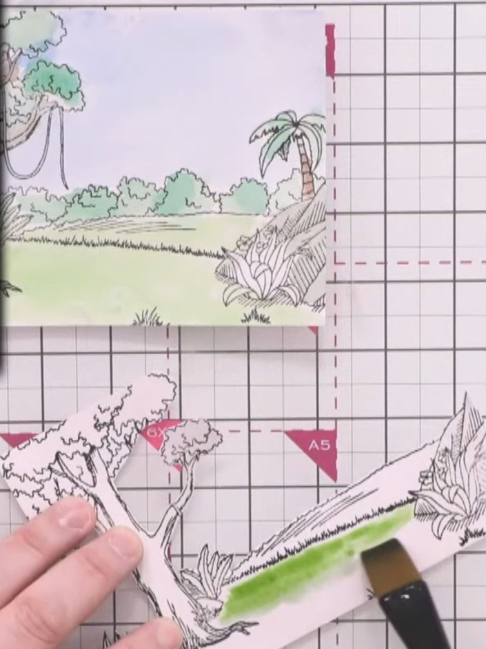 Step 8: Apply vibrant greens and yellows to the middle layer using the ink pad and blending tool, making this layer mo