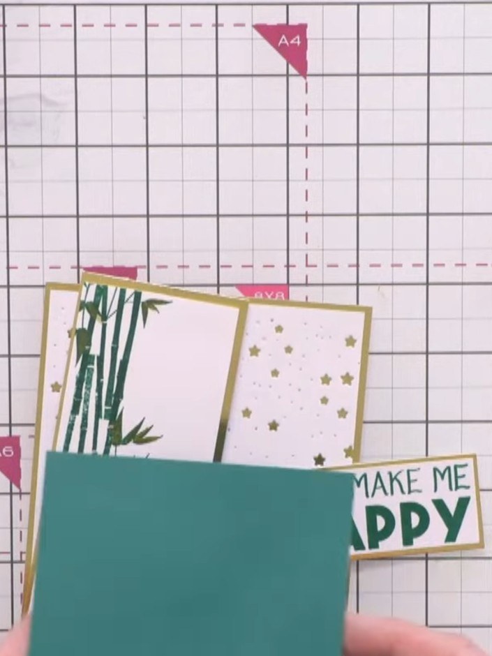 Step 10: Cut diagonal strips from green card scraps. Position them in opposite corners of your card to balance the colo