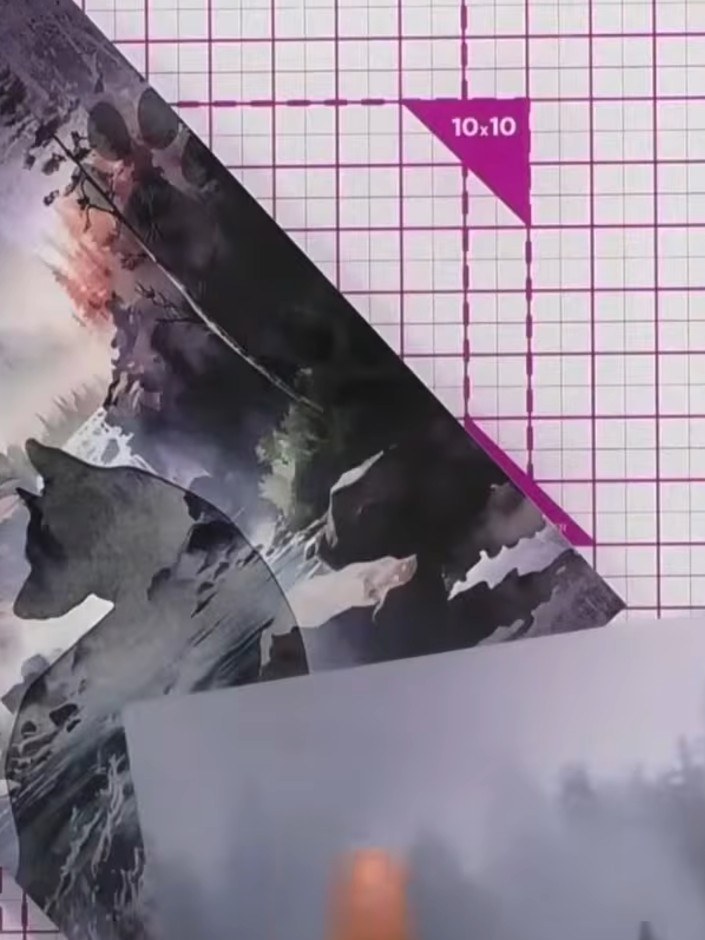 Step 1: Tear the vellum wrap along a tree line or design element from the printed image to create a natural-looking ed